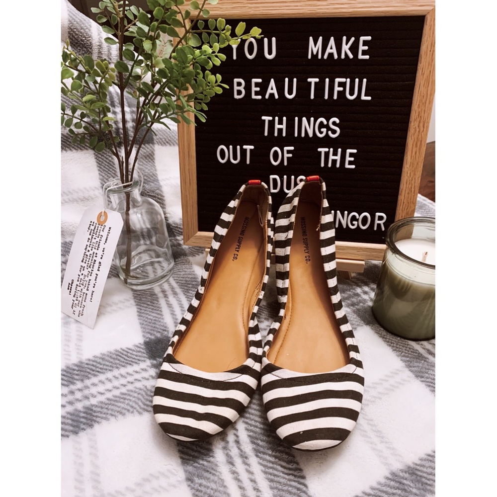 Black and white striped ballet flats